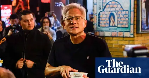 picture of Nvidia CEO holding a stack of cash in a crowded location with the guardian branding at the bottom right